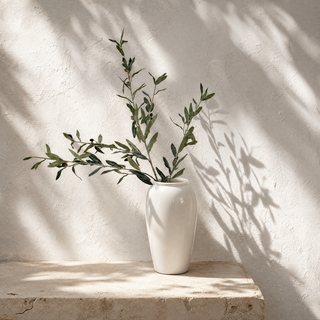 Olive faux branch foliage close up