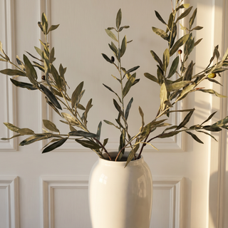 Olive Stem Long Faux Branch Arrangement styled in a vase