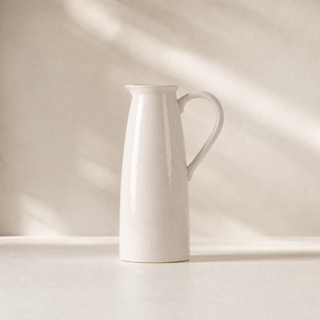 The Watermill Jug studio shot against a soft white background with gentle sunlight and shadows