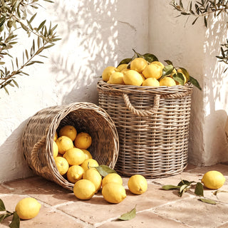 The Grey Rattan Basket with Jute Handles shown as a set of four sizes