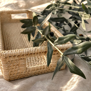 Olive Stem Long Faux Branch Bouquet on a tray with a linen tablecloth in soft sunlight
