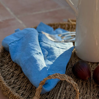 Signature Pure Linen Napkins in Amalfi Blue in a place setting