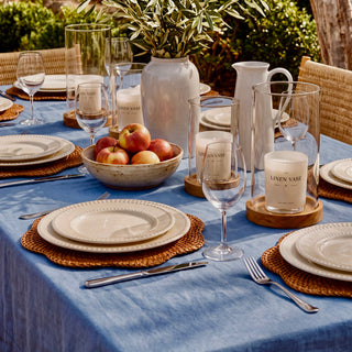Signature Pure Linen Tablecloth in Amalfi Blue on a dining table