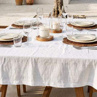 Signature Pure Linen Tablecloth in Arctic White detail of the soft drape