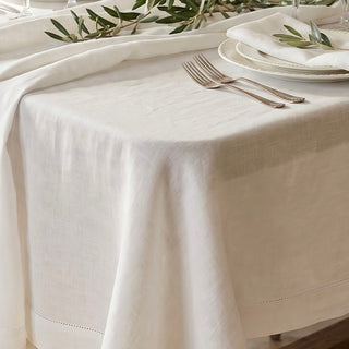 Signature Pure Linen Tablecloth in Arctic White on a dining table